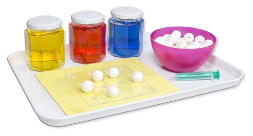 Montessori Übung mit Einwegspritze
