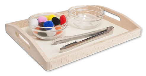 Montessori Zangenübung mit Pompons